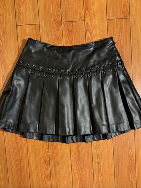 Guess Black Faux Leather Pleated Mini Skirt with Eyelet Lace Detail